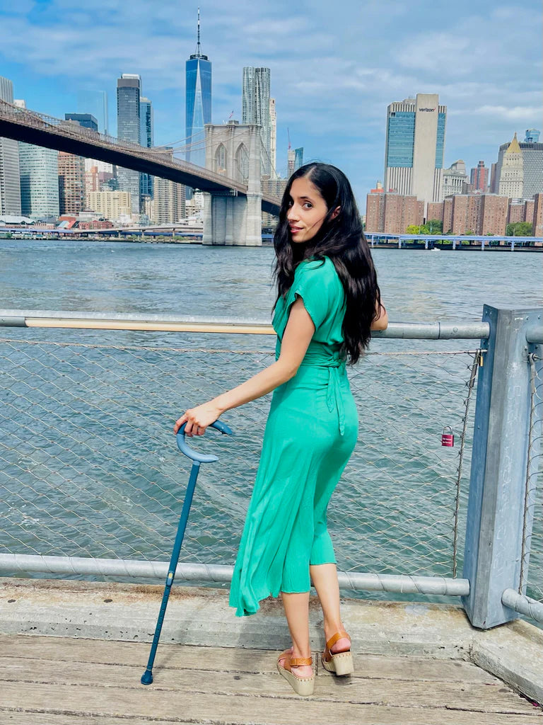marissa with blue c-grip cane in nyc
