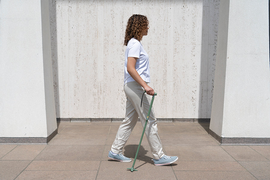 women walking with cane