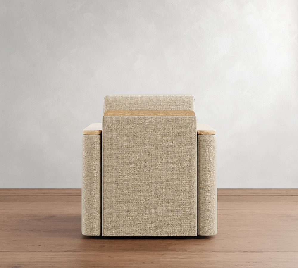 Beige armchair with wooden accents on a wooden floor and light gray wall background
